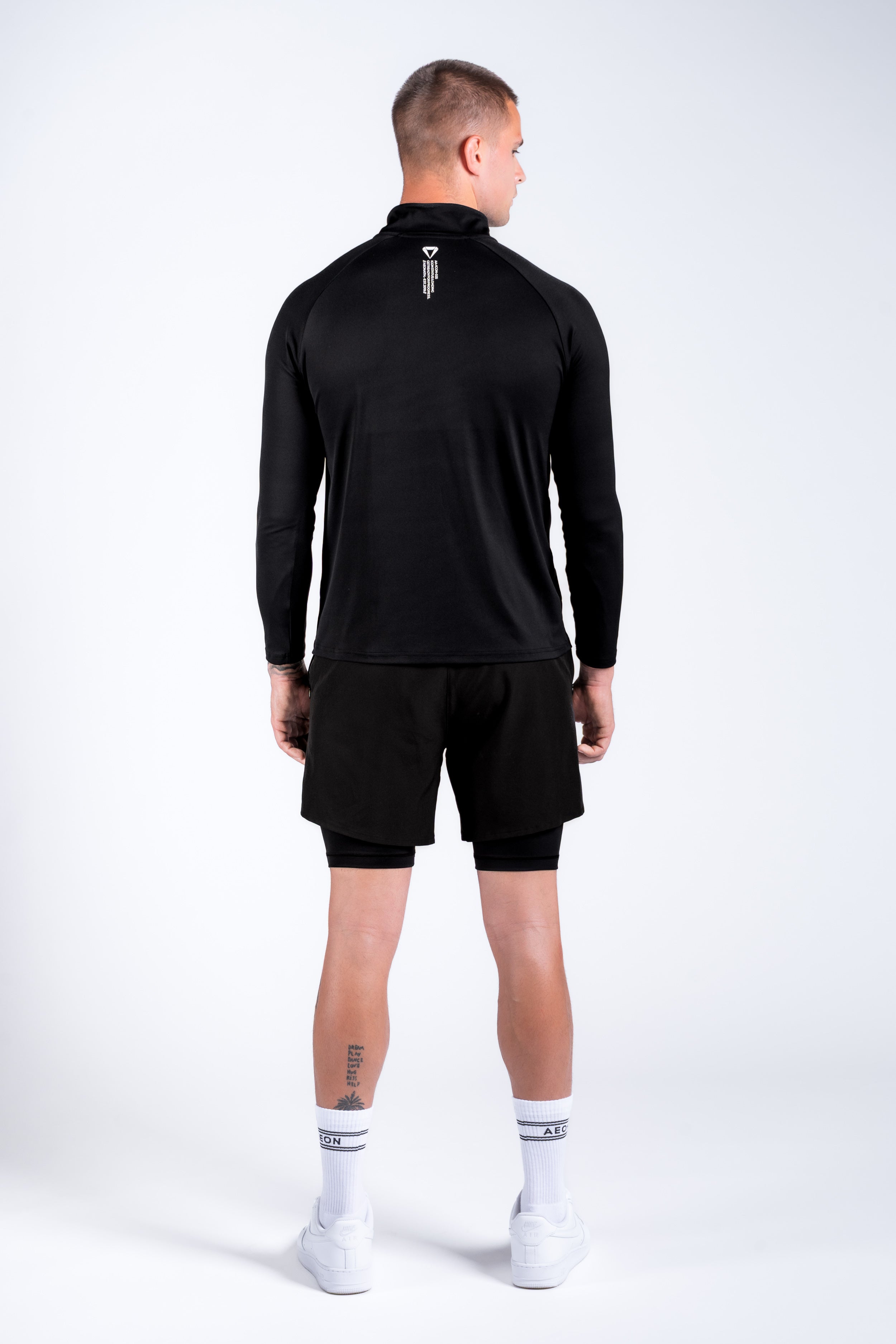 ICON PERFORMANCE HALF ZIP TEE