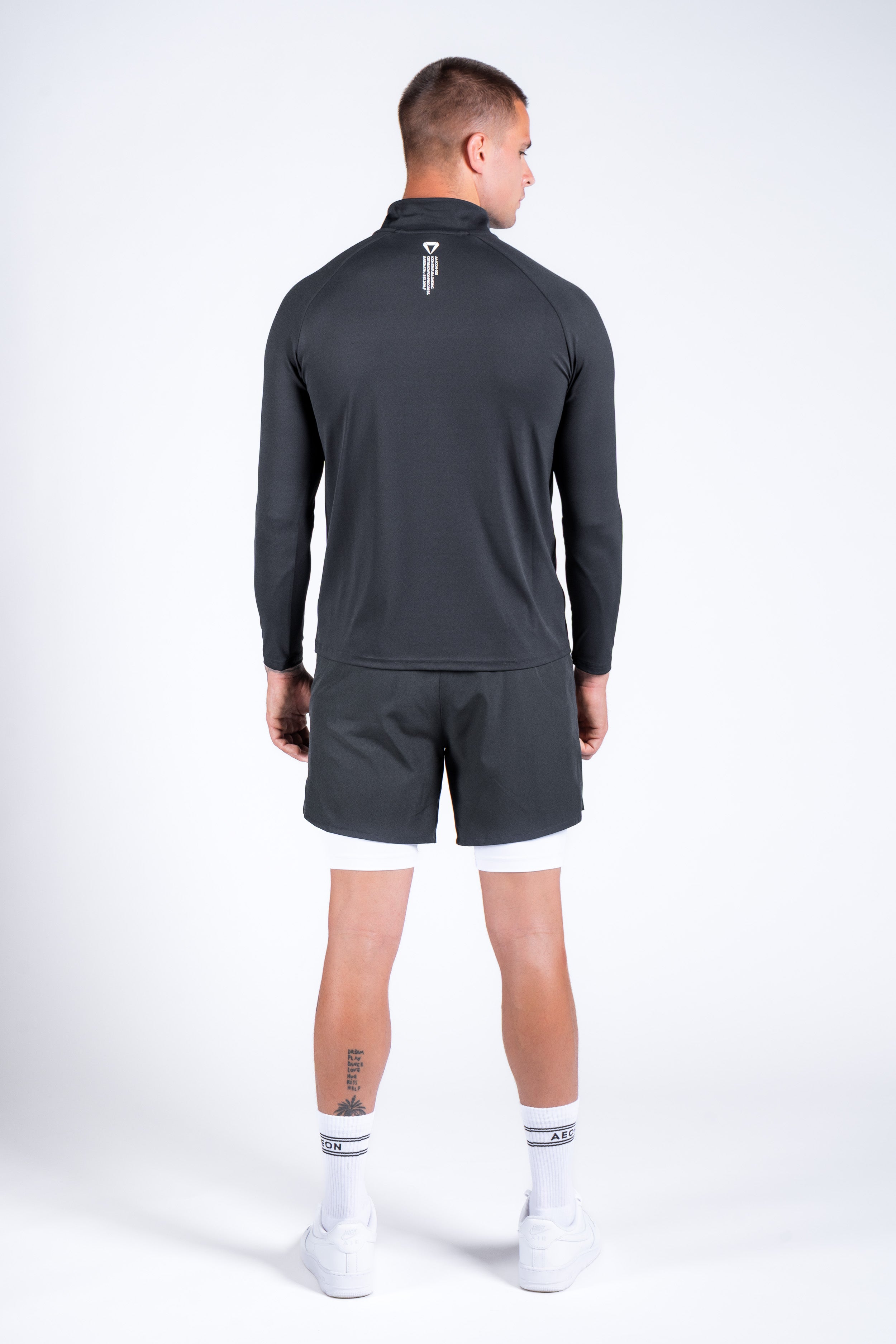 ICON PERFORMANCE HALF ZIP TEE